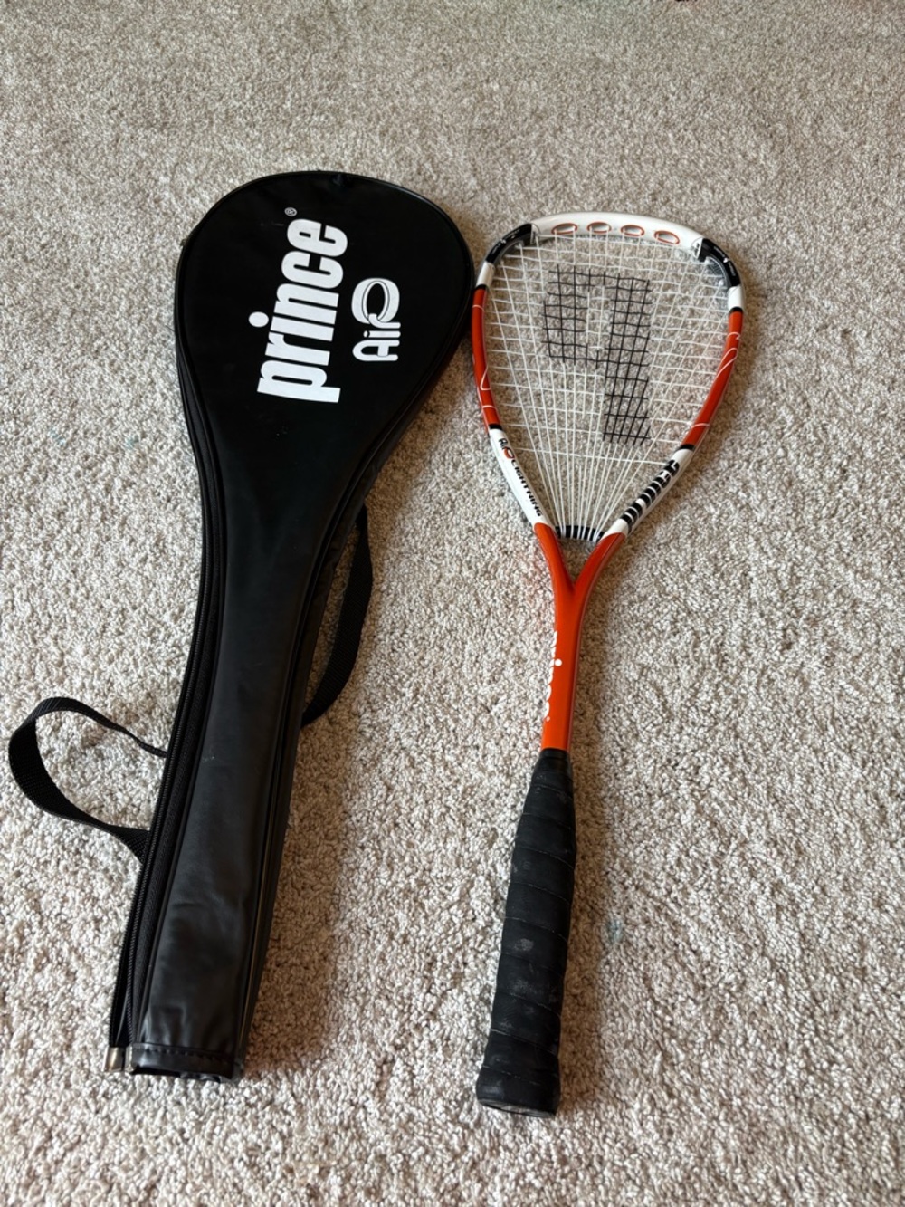 Prince AirO Lightning squash racquet with a matching cover